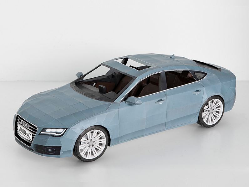 À la demande d'Audi, le designer Taras Lesko a réalisé une Audi A7 entièrement en papier à partir de...