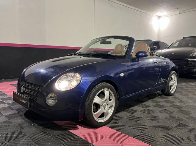 Daihatsu Copen 0.7i VVT . Bleu fonc de 2003