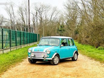  Voir détails -Mini Cooper Mpi Surf blue à Aubergenville (78)