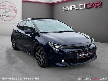  Voir détails -Toyota Corolla HYBRIDE MY21 122h Design toit ouvrant à  La Madeleine (59)
