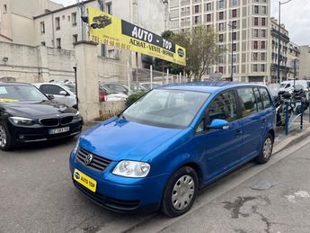  Voir détails -Volkswagen Touran 1.6 102CH CONFORT à Pantin (93)