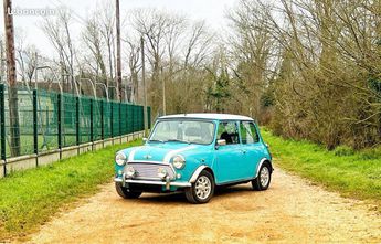  Voir détails -Mini Cooper Mpi Surf blue à Aubergenville (78)