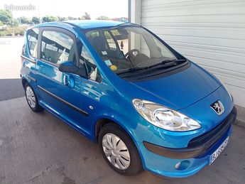  Voir détails -Peugeot 1007 Belle 1.4i pack clim 87000 kms 2006 repr à Marly (57)