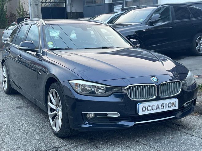 BMW Serie 3 330dA 258ch Lounge bleu metal de 2014