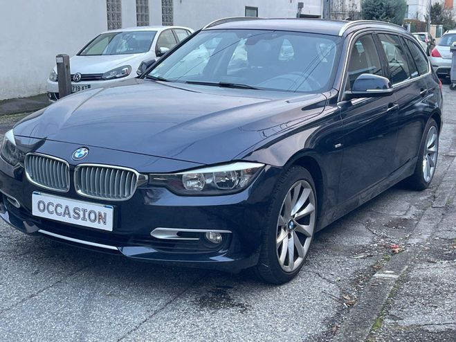 BMW Serie 3 330dA 258ch Lounge bleu metal de 2014
