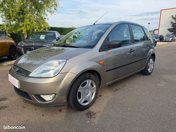  Voir détails -Ford Fiesta 1.6 16V 80 CH Ghia à Monteau (89)