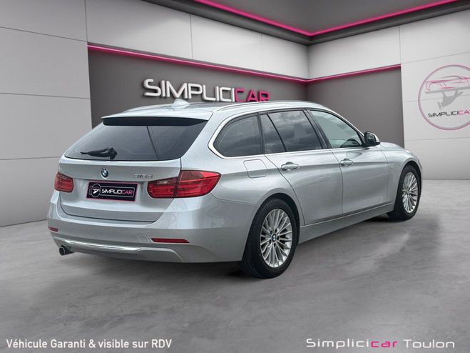 BMW Serie 3 TOURING F31 318d 143 ch Luxury garantie  Gris de 2014