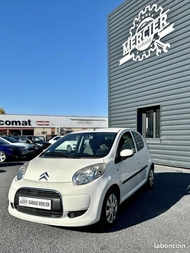 Cliquer pour voir la photo suivante Citroen C1 1.0 68ch CONFORT Clim   5 portes Blanc de 2011