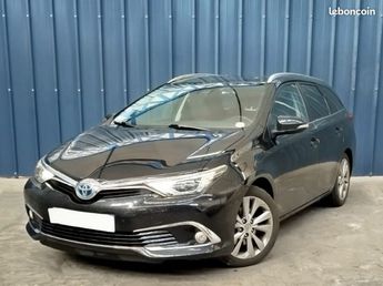  Voir détails -Toyota Auris Touring Sports Phase 2 1.8 VVT-i HSD 16V à Halluin (59)