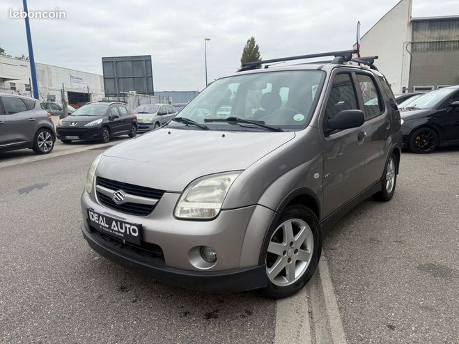 Cliquer pour voir la photo suivante Suzuki Ignis 1.5 VVT GLX 4X4 En L'état Gris de 2004
