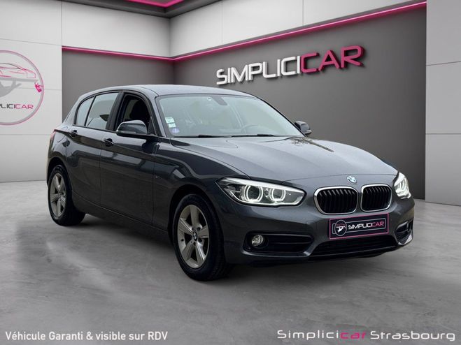 Cliquer pour voir la photo suivante BMW Serie 1 F20 LCI 118i 136 ch Sport A FEUX LED - D Gris de 2015