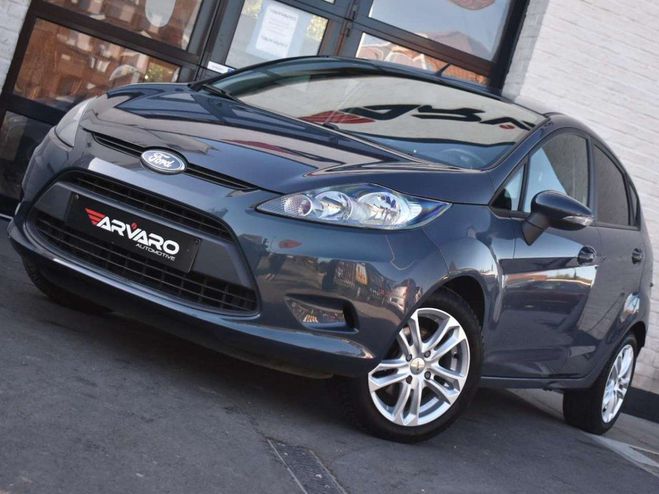 Cliquer pour voir la photo suivante Ford Fiesta 1.25i Titanium Topstaat Airco Garantie Gris Métallisé de