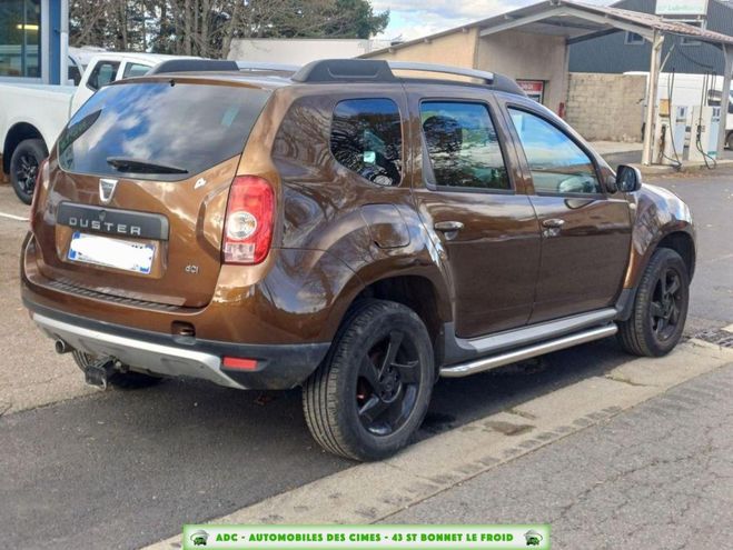 Dacia Duster 1.5 DCI 110 FAP 4X4 PRESTIGE Marron Clair de 2012