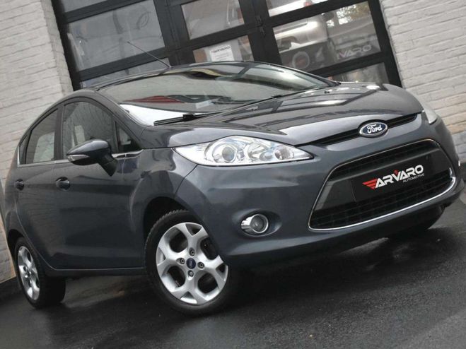 Ford Fiesta 1.25i Xenon PDC Verw Zetels Garantie Gris Mtallis de 