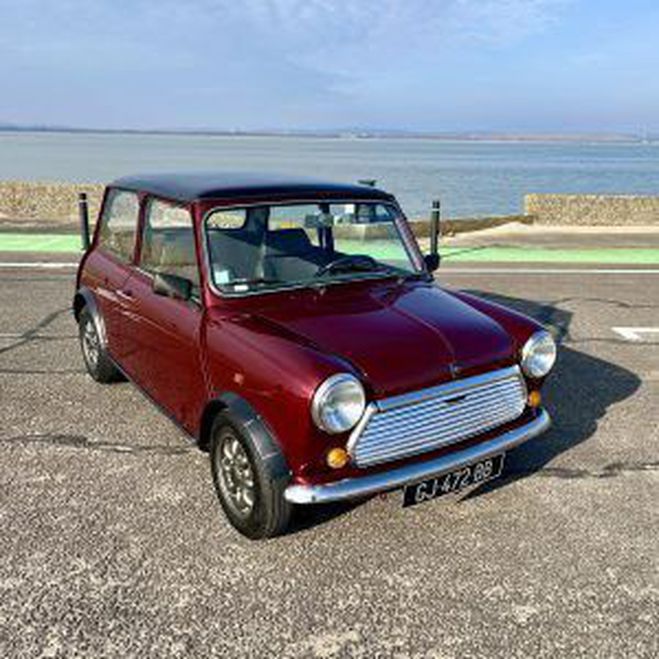 Cliquer pour voir la photo suivante Austin Mini 1000 Special Bordeaux/Noir de 1990