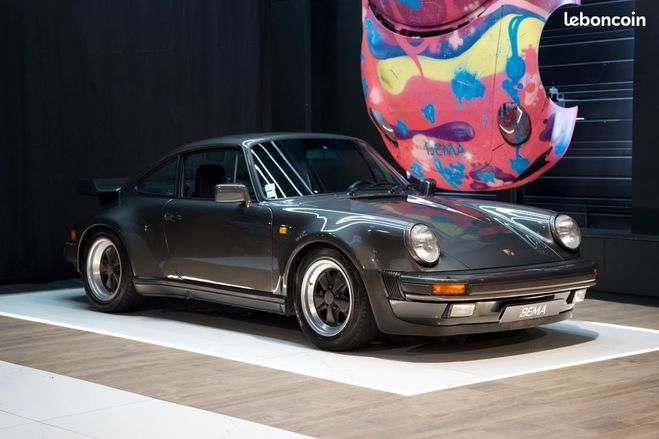 Cliquer pour voir la photo suivante Porsche 911 (930) TURBO 3.3 300cv | BVM5 G50 Matchin Gris de 1992