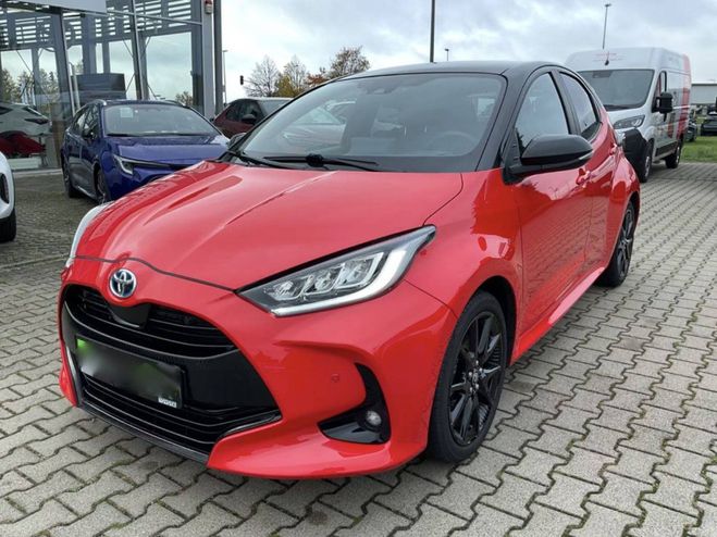Cliquer pour voir la photo suivante Toyota Yaris 1.5 Style ACC+LED+Navi+Pano+SD+SHZ+2xCli Tokiofusion Rouge/ Mica Noir de 2023