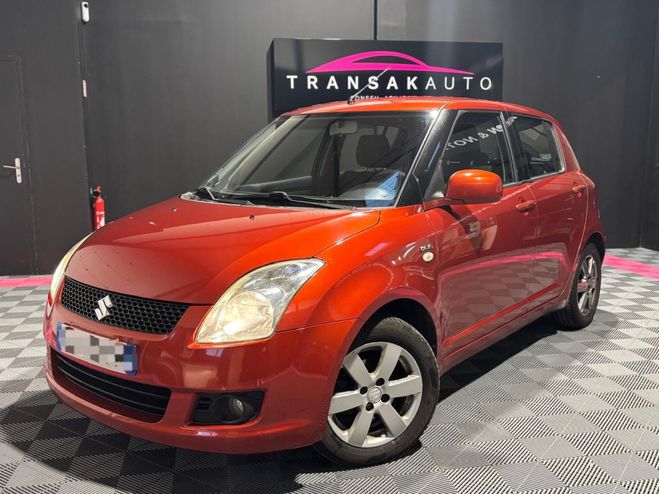 Cliquer pour voir la photo suivante Suzuki Swift II 1.3 DDiS 75ch GL Orange de 2009