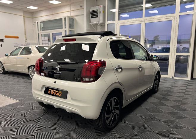 Peugeot 108 1.2l vti 80ch feline top semi cabriolet  Blanc de 2017