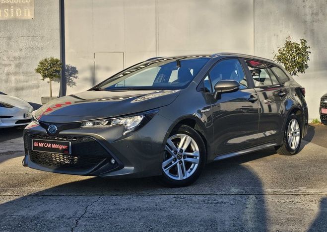 Toyota Corolla Superbe touring hybride 2022 1�main Beige de 2022