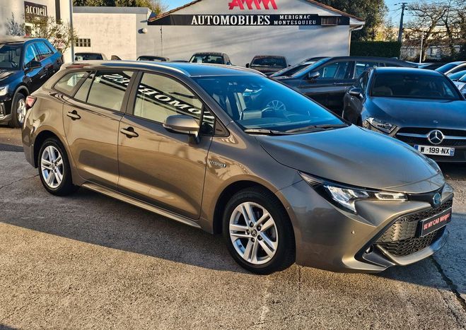 Toyota Corolla Superbe touring hybride 2022 1�main Beige de 2022