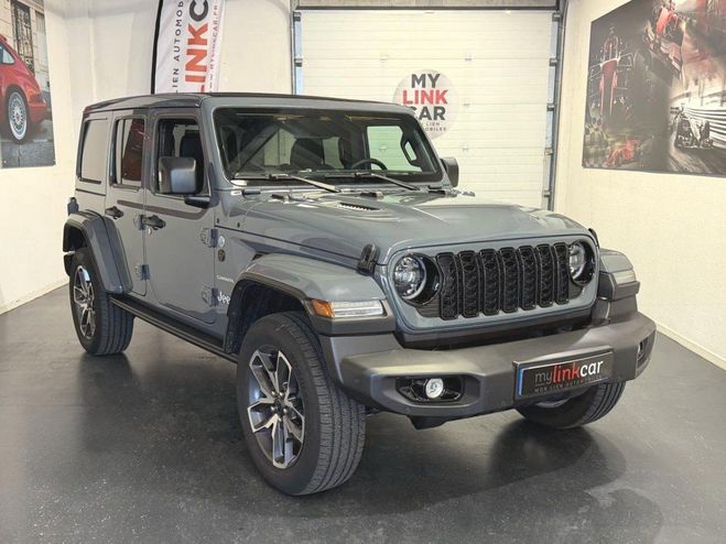 Cliquer pour voir la photo suivante Jeep Wrangler Unlimited Sahara 4xe 2.0i T 380 Command GRIS de 2024