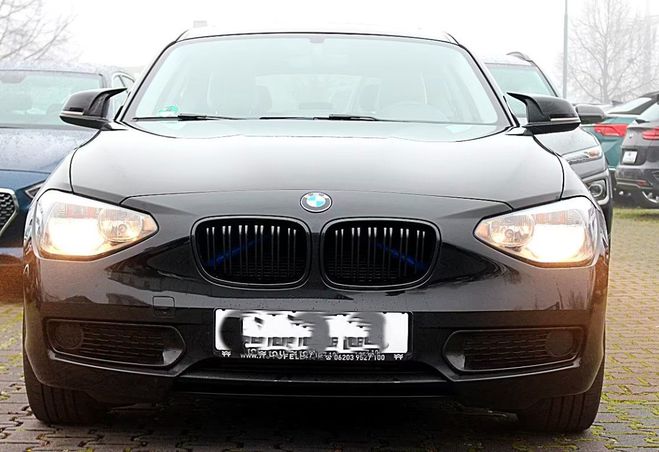 Cliquer pour voir la photo suivante BMW Serie 1 116 i 136 BVA Ligne urbaine / TOIT OUVRA noir métal de 2014