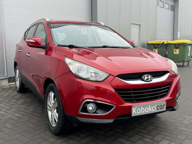 Cliquer pour voir la photo suivante Hyundai Ix35 2.0i 2WD Lounge --CUIR -- GPS GARANTIE 1 Rouge Métallisé de