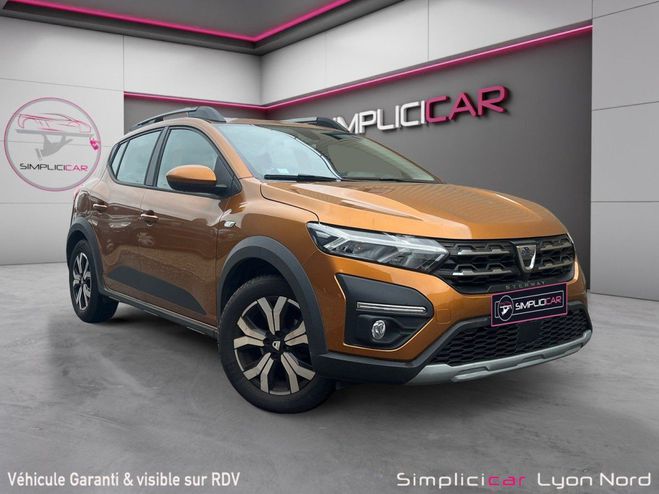 Cliquer pour voir la photo suivante Dacia Sandero TCe 90 Confort ( Garantie 12 mois) Orange de 2021