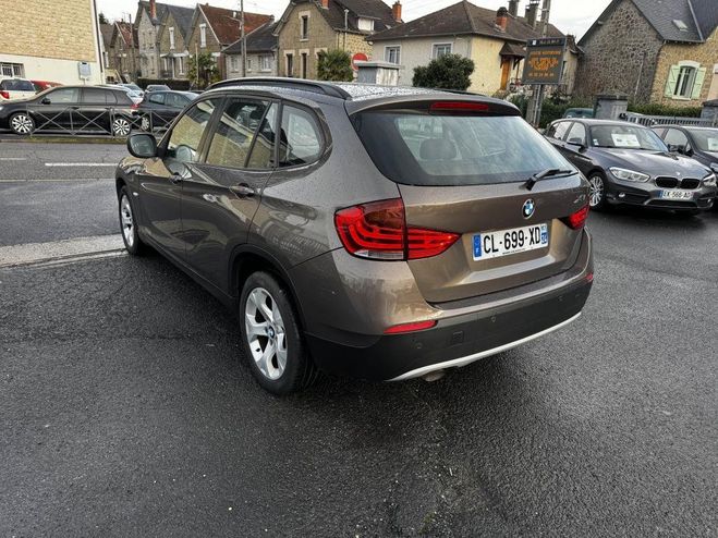 BMW X1 sDrive 18d - 143 Confort clim + radar AR MARRON FONCE de 2012