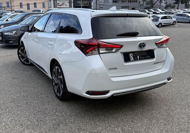 Toyota Auris Touring Sports HSD 136H SALOMON Blanc de 2016