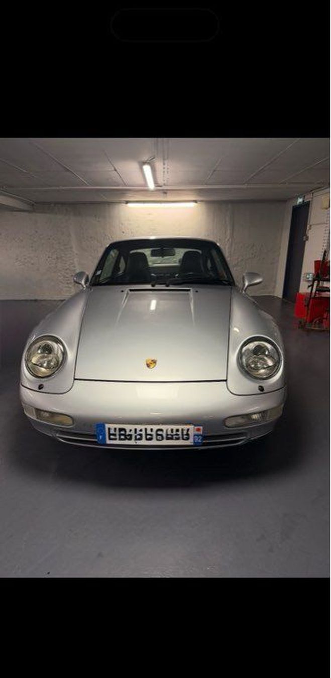 Cliquer pour voir la photo suivante Porsche 911 993 type carrera 2 boîte auto Gris de 1995