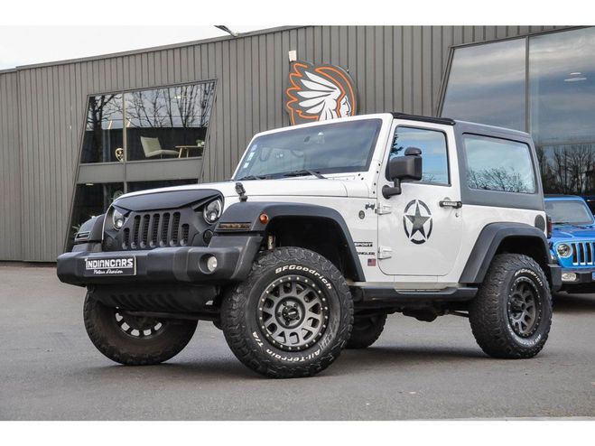 Cliquer pour voir la photo suivante Jeep Wrangler 3.6i - BVA 2014 Sahara BLANC de 2014