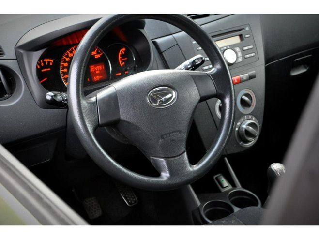 Daihatsu Cuore 1.0i - 69 2007 . Vert m�tallis� de 2010