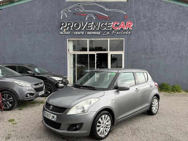 Cliquer pour voir la photo suivante Suzuki Swift 1.3 DDIS75 GL 5P Gris C de 2012