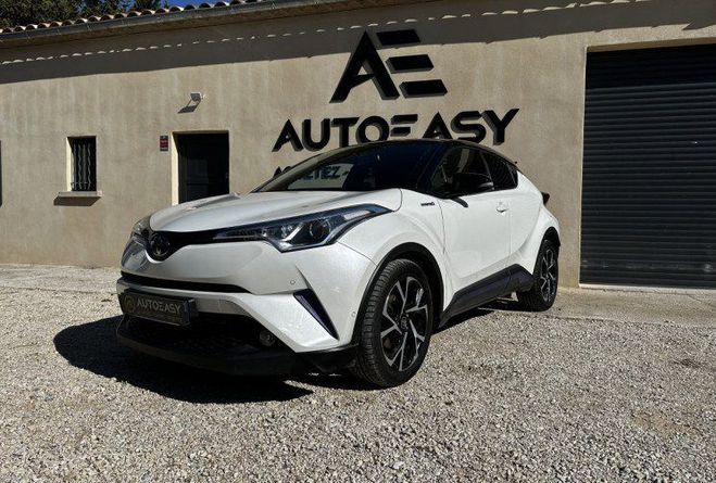 Cliquer pour voir la photo suivante Toyota C HR 122h Distinctive 2WD E-CVT / FULL ENTRET BLANC de 2017