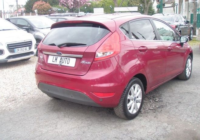 Ford Fiesta V 1600 TDCI 90 GHIA 5P Rouge de 2009
