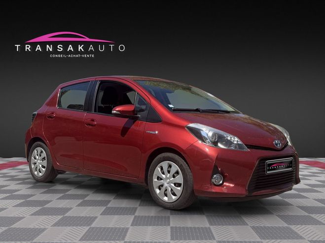 Toyota Yaris HYBRIDE 100h Dynamic Pack Zen / 1e main  Rouge de 2012