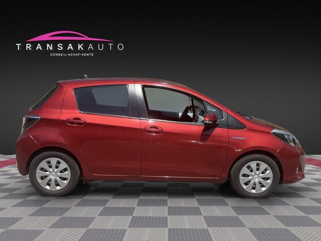 Toyota Yaris HYBRIDE 100h Dynamic Pack Zen / 1e main  Rouge de 2012