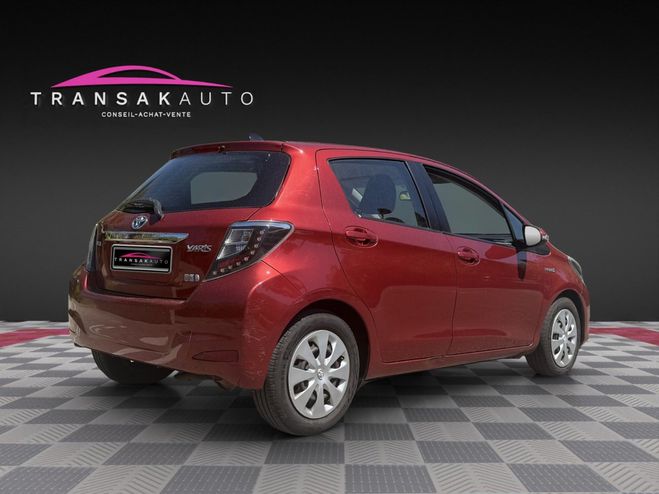 Toyota Yaris HYBRIDE 100h Dynamic Pack Zen / 1e main  Rouge de 2012