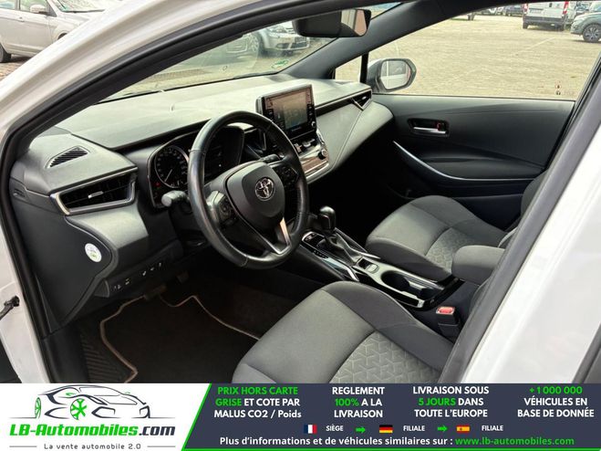 Toyota Corolla Hybride 122 ch BVA Blanc de 2021