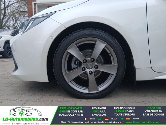 Toyota Corolla Hybride 122 ch BVA Blanc de 2019