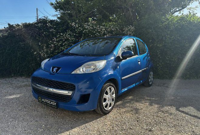 Peugeot 107 1.0 12v 68cv Pack Limited 5p / CLIMATISA BLEU de 2010
