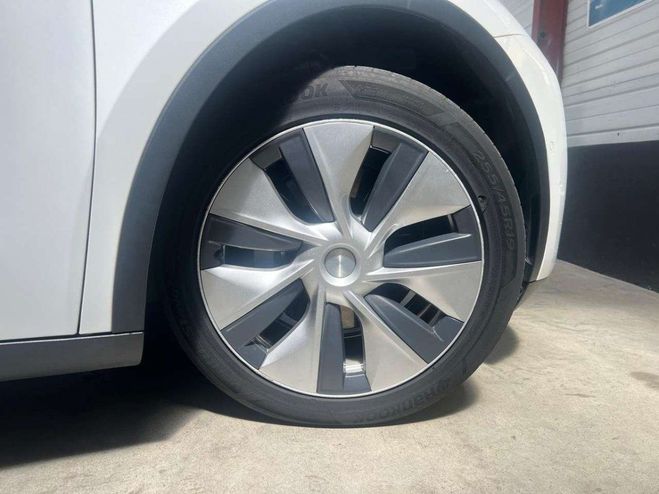 Tesla Model Y long range awd 352 ch 75 kwh 1 ere main Blanc de 2022