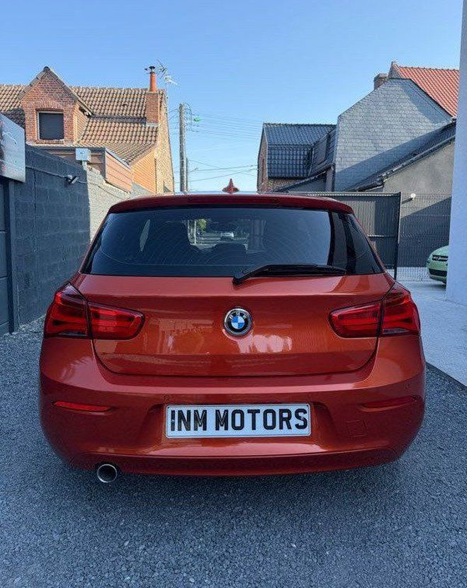 BMW Serie 1 116d 116 ch automatique ? gps garantie 6 Orange de 2017