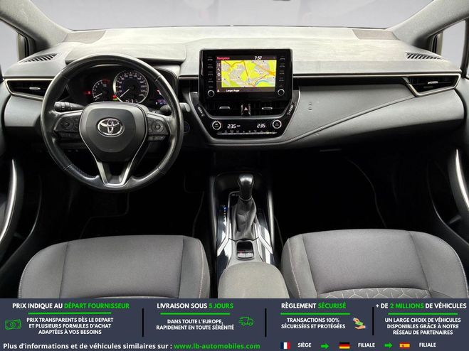 Toyota Corolla Hybride 122 ch BVA Blanc de 2021