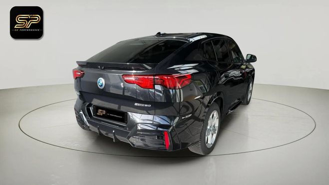 BMW IX 2 eDRIVE20 M SPORT 204 CH * HARMAN KARDO Noir de 2024